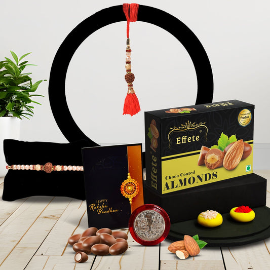 Bright Rakhi With Colorful Beads And A Shiny Center With Effete Choco Almond Chocolate 32Gm ,Silver Color Pooja Coin, Roli Chawal & Greeting Card - Needs You