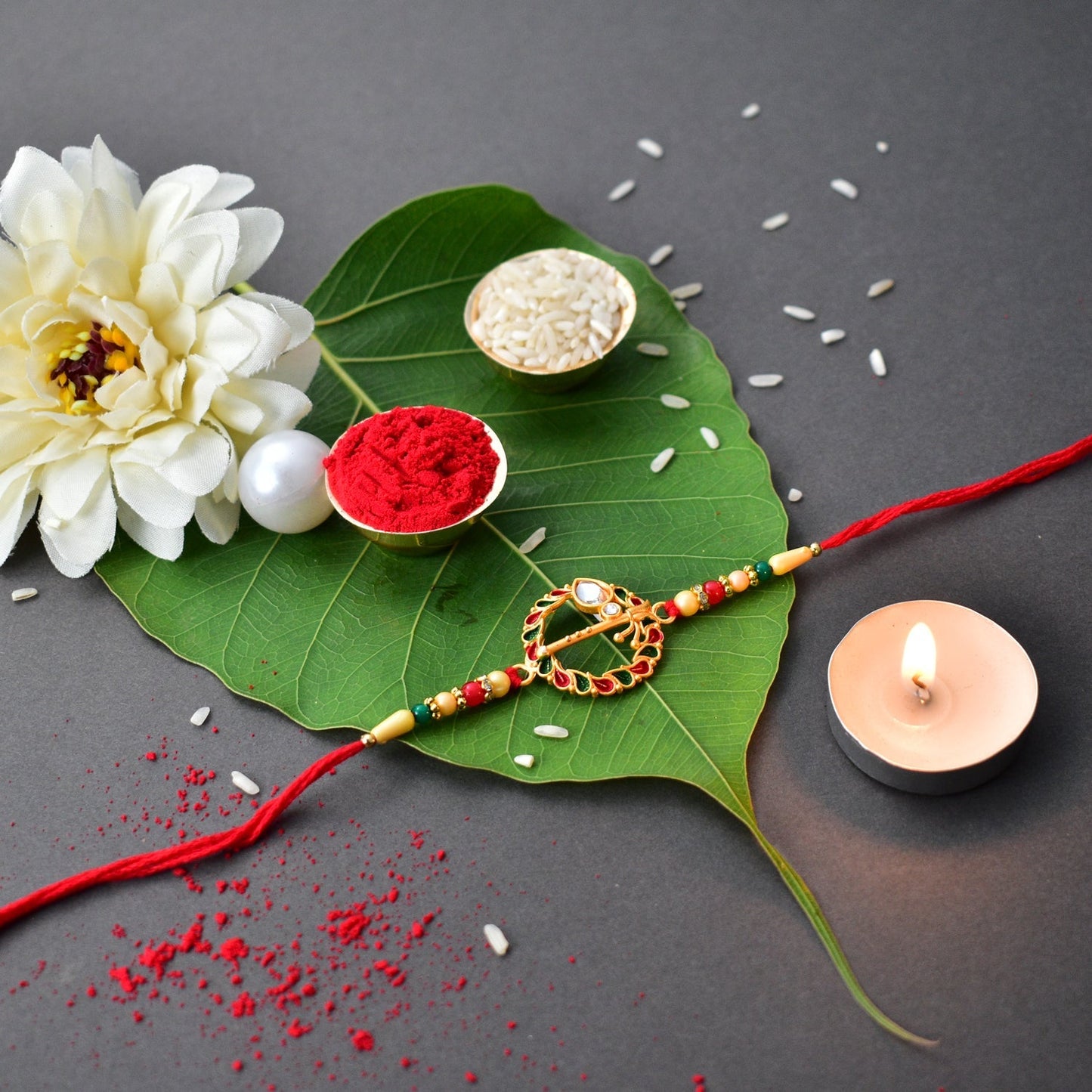 Flute In Circle With Red & Green Beads With Effete Choco Almond Chocolate 32Gm ,Silver Color Pooja Coin, Roli Chawal & Greeting Card - Needs You