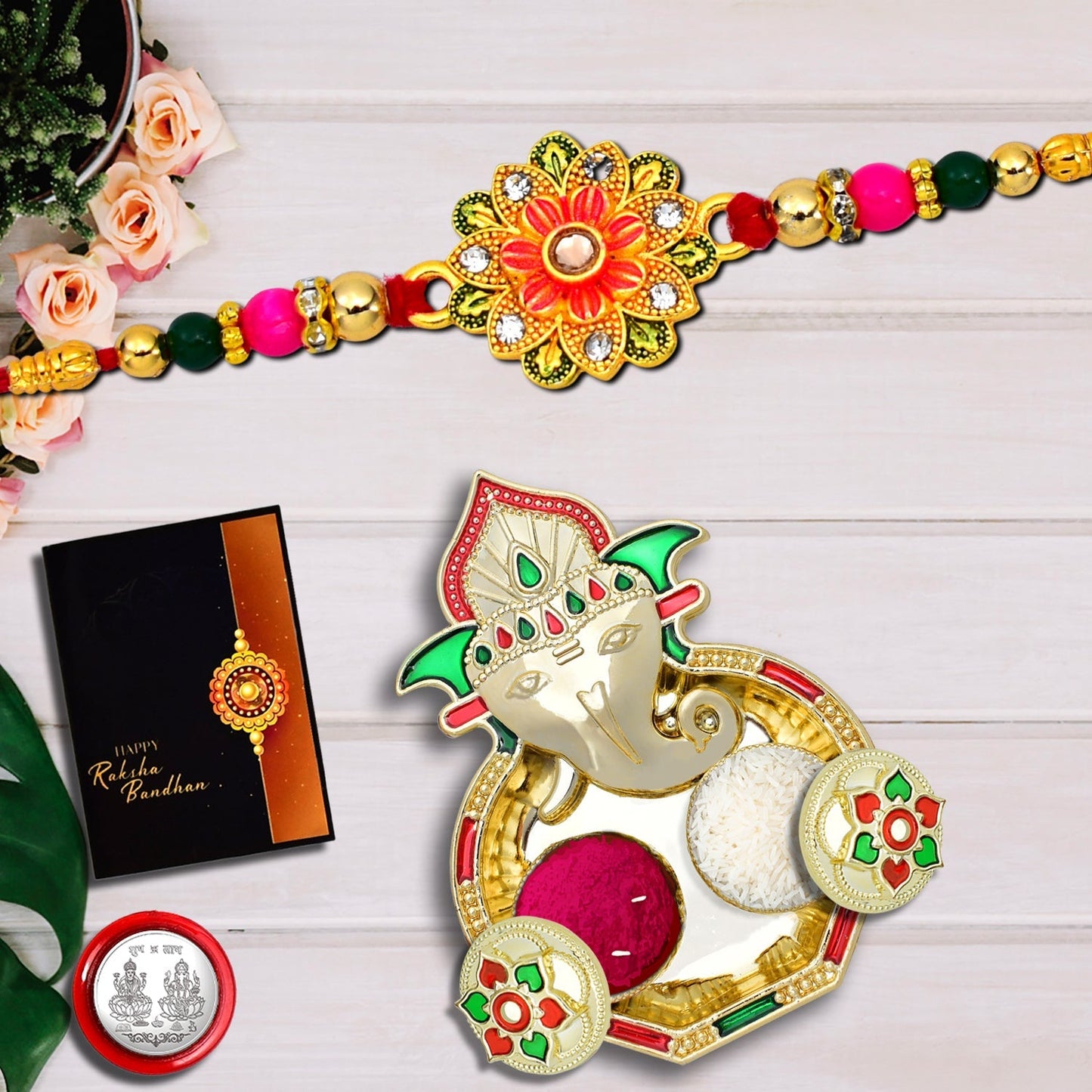 Green And Red Flower Rakhi With Ganesha Pooja Thali Set ,Silver Color Pooja Coin, Roli Chawal & Greeting Card - Needs You