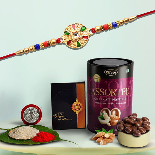 Round Rakhi With Green And Red Mina And Diamond With Effete Assorted Chocolate 96Gm ,Silver Color Pooja Coin, Roli Chawal & Greeting Card - Needs You