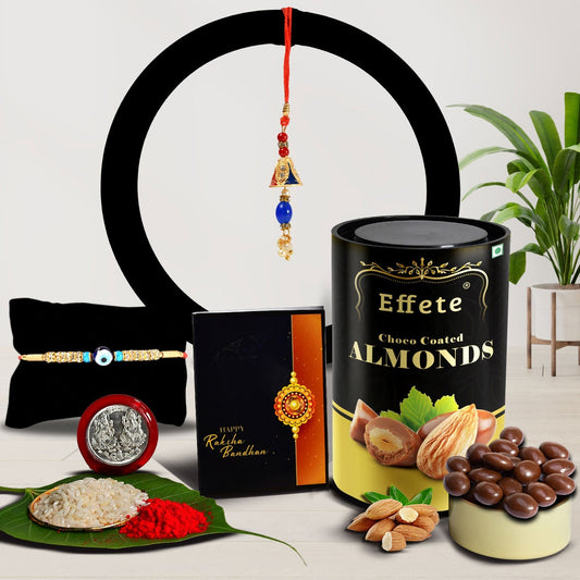 Traditional Design Diamond Rakhi With Effete Choco Almond Chocolate 96Gm ,Silver Color Pooja Coin, Roli Chawal & Greeting Card - Needs You